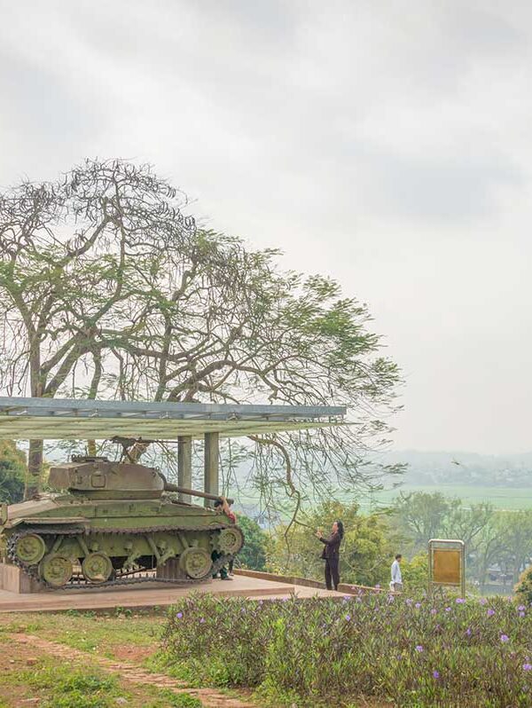 Dien Bien Phu war tours by Local Vietnam | travelers visiting former French bunkers and trenches at the battlefield site