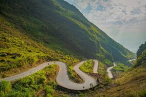 Ha Giang tours – Local Vietnam | winding road through Ma Pi Leng Pass on the famous Ha Giang Loop in northern Vietnam