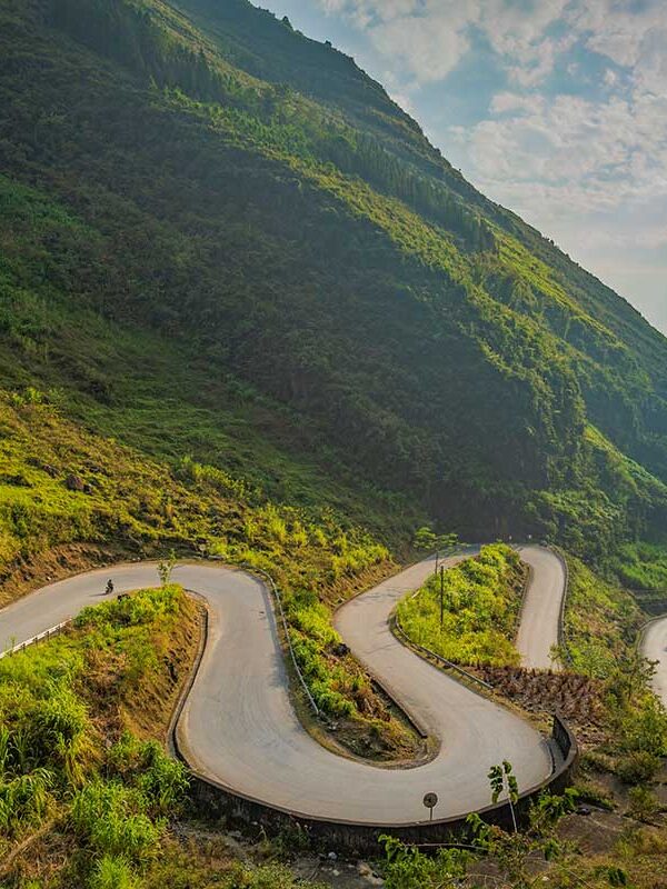 Ha Giang tours – Local Vietnam | winding road through Ma Pi Leng Pass on the famous Ha Giang Loop in northern Vietnam