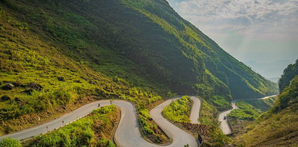 Ha Giang tours – Local Vietnam | winding road through Ma Pi Leng Pass on the famous Ha Giang Loop in northern Vietnam