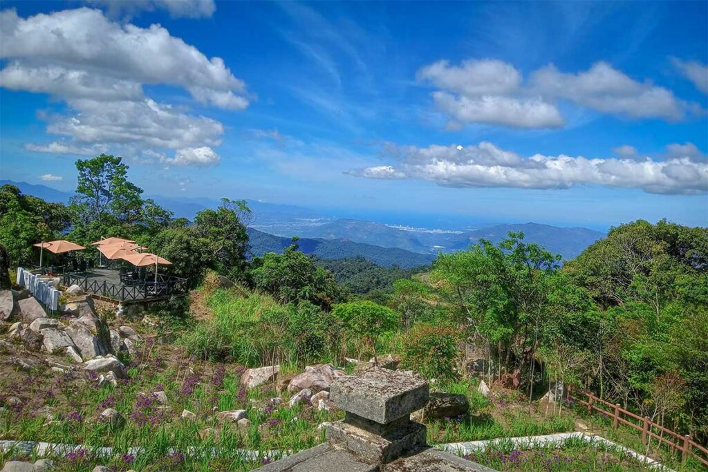 Panoramic viewpoint at Hon Ba peak with terrace café and sweeping coastal views towards Nha Trang.