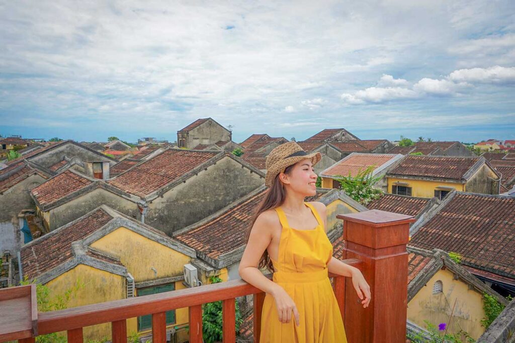 Nhung Phung from Local Vietnam exploring Hoi An Ancient Town and its iconic tiled rooftops during her travels to research local tours.