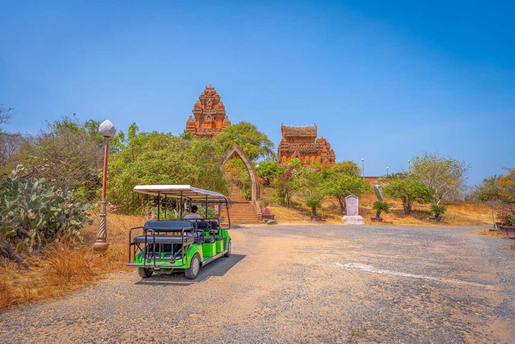 Electric cart at the base of Po Klong Garai Tower in Phan Rang, offering an easier way for visitors to reach the Cham temple complex on Trau Hill.