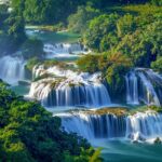 The cascading Ban Gioc Waterfall near the Chinese border — one of the most spectacular natural sights included in northern Vietnam tours.