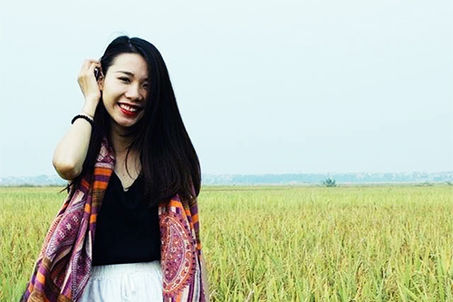 Hien of Local Vietnam, standing between the rice fields of northern Vietnam