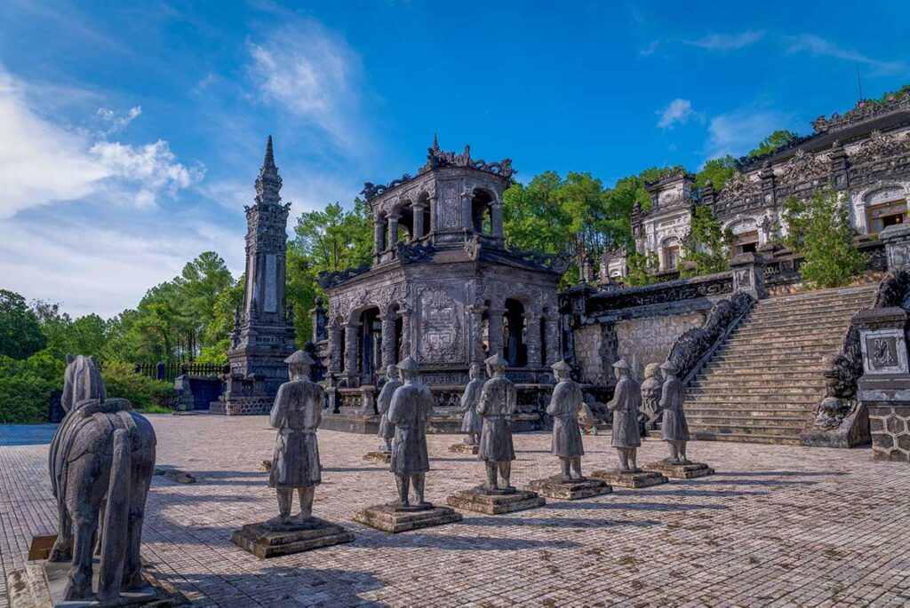 Khai Dinh Tomb tours featuring detailed stone architecture and royal guardian statues in Hue