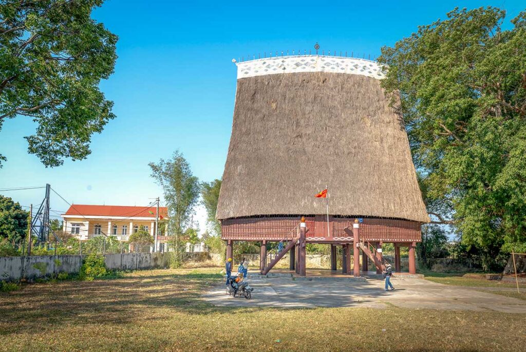 Kon Tum tours with a traditional Rong house standing tall in an ethnic village