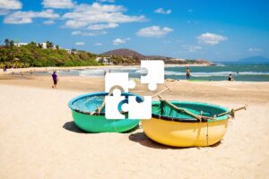 Private Mui Ne tour with a personalized itinerary, featuring sandy beaches, local fishing boats, and relaxed coastal scenery.