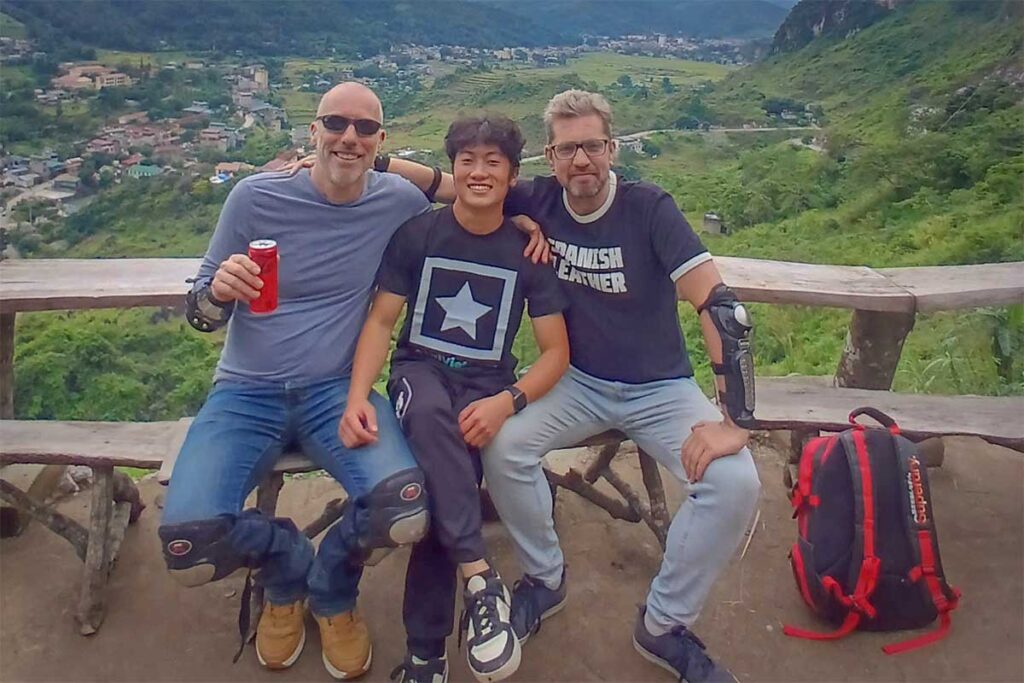 Private Vietnam tour with Local Vietnam guide at a Ha Giang mountain viewpoint — authentic guided travel experience.