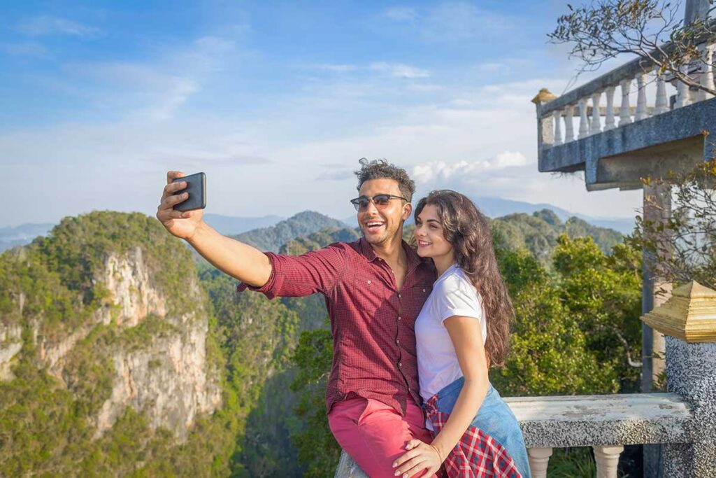 Vietnam honeymoon trips visiting panoramic mountain viewpoints, highlighting scenic landscapes and shared moments during a romantic Vietnam holiday