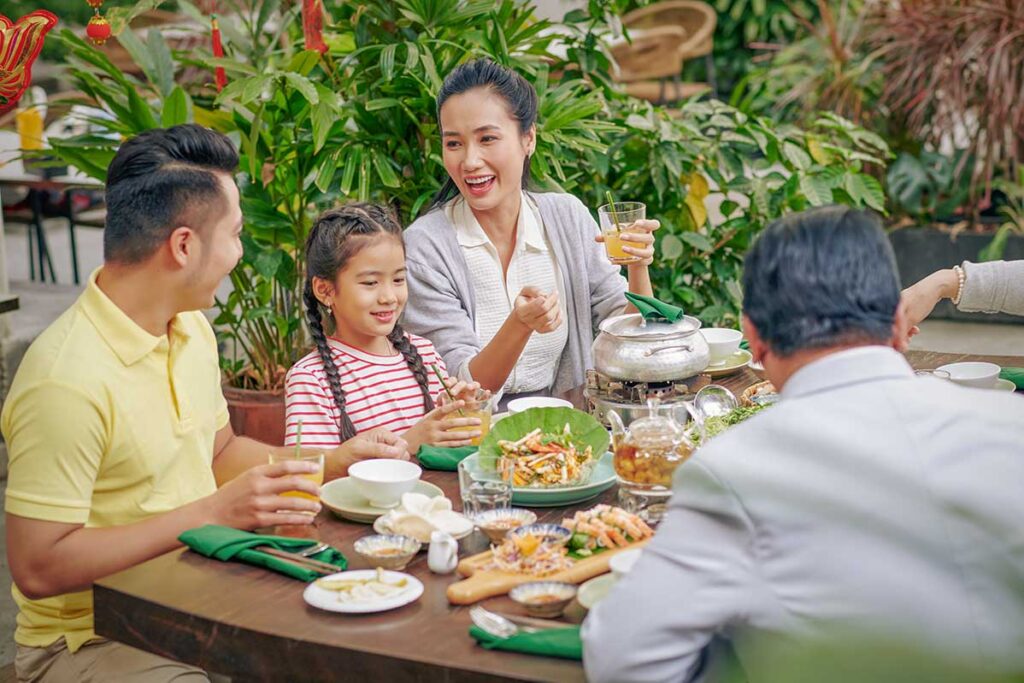 Vietnam slow travel holidays including time spent with a Vietnamese family, showcasing meaningful cultural exchange as part of a complete Vietnam trip