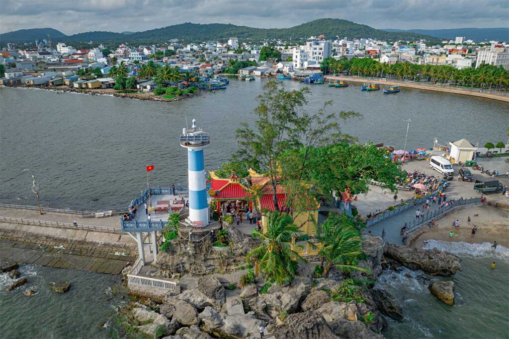 Aerial view of Dinh Cau Temple and lighthouse in Duong Dong Phu Quoc by the river mouth