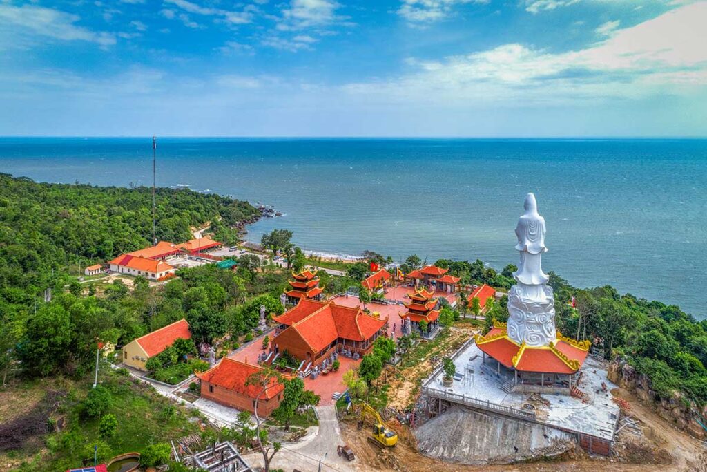 Aerial view of Ho Quoc Pagoda with Quan Am statue and sea views in Phu Quoc