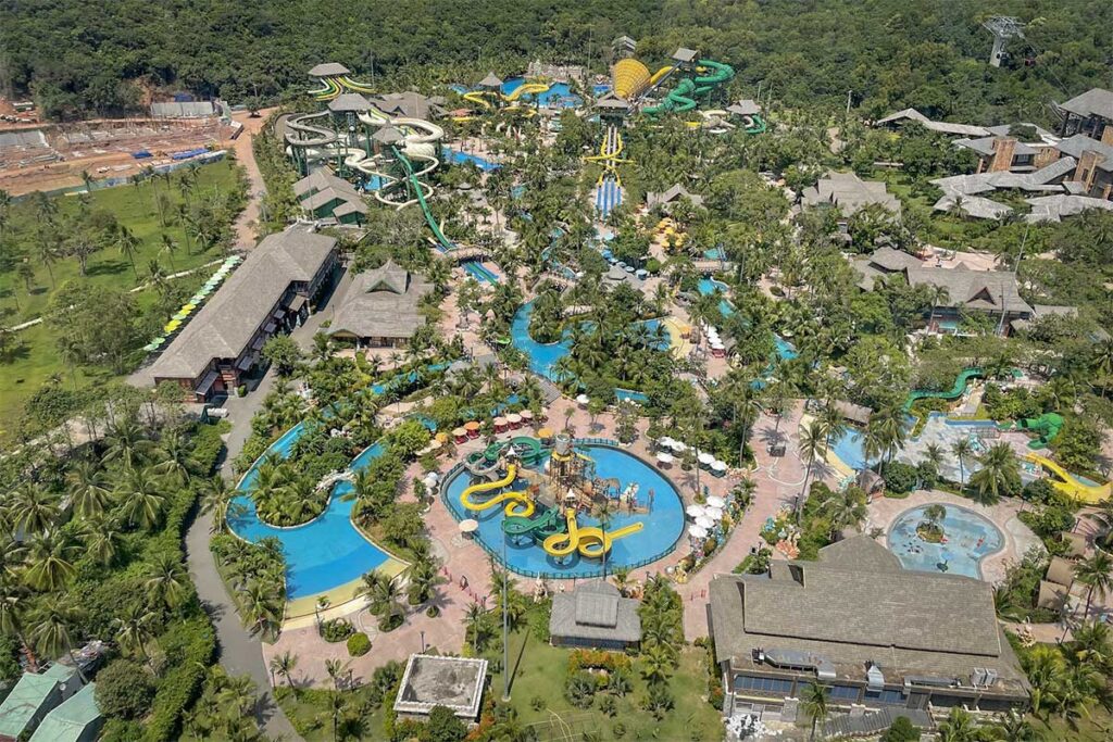 Aerial view of Aquatopia Water Park Phu Quoc showing pools lazy river slides and tropical layout on Hon Thom Island