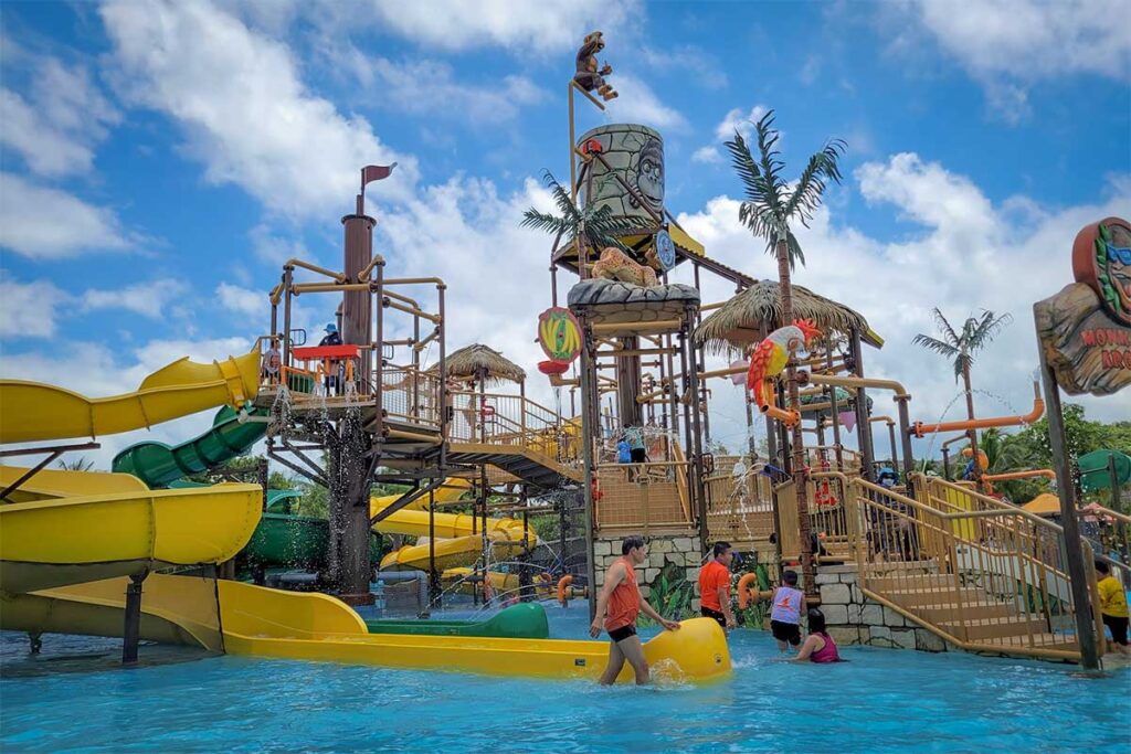Aquatopia Water Park Phu Quoc kids splash pool with small slides play tower and family water area