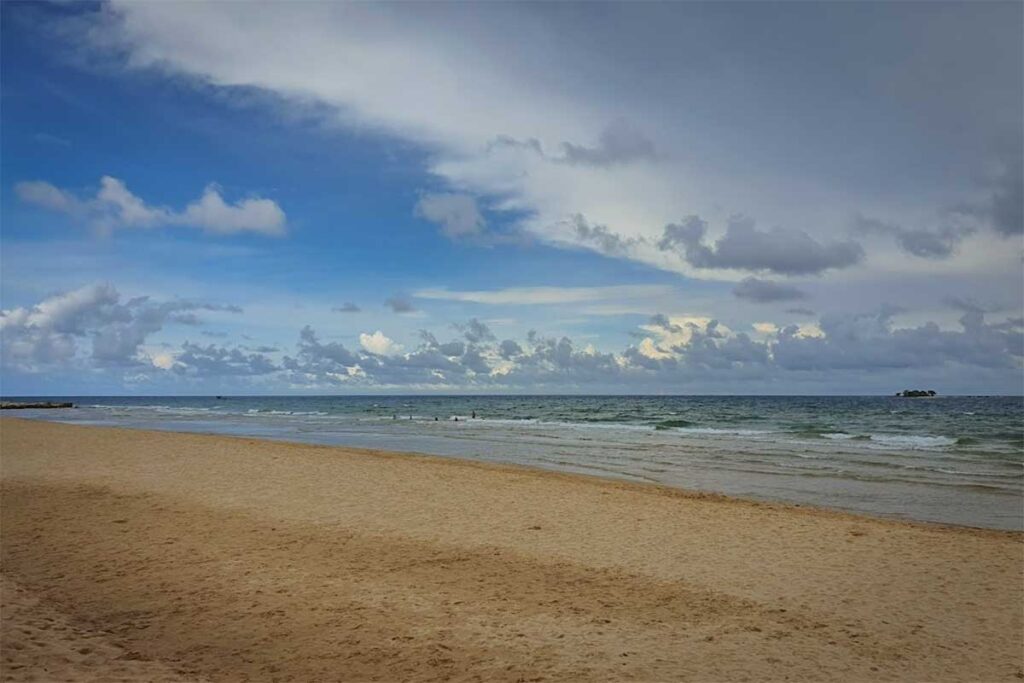 Wide sandy shoreline at Bai Dai Beach Phu Quoc with calm sea and open coastal views