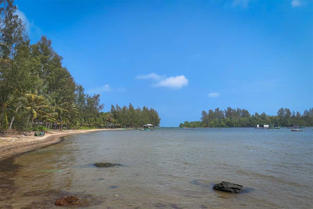 Shallow bay near Hon Mot Island at Bai Thom Beach Phu Quoc with calm water and peaceful coastline