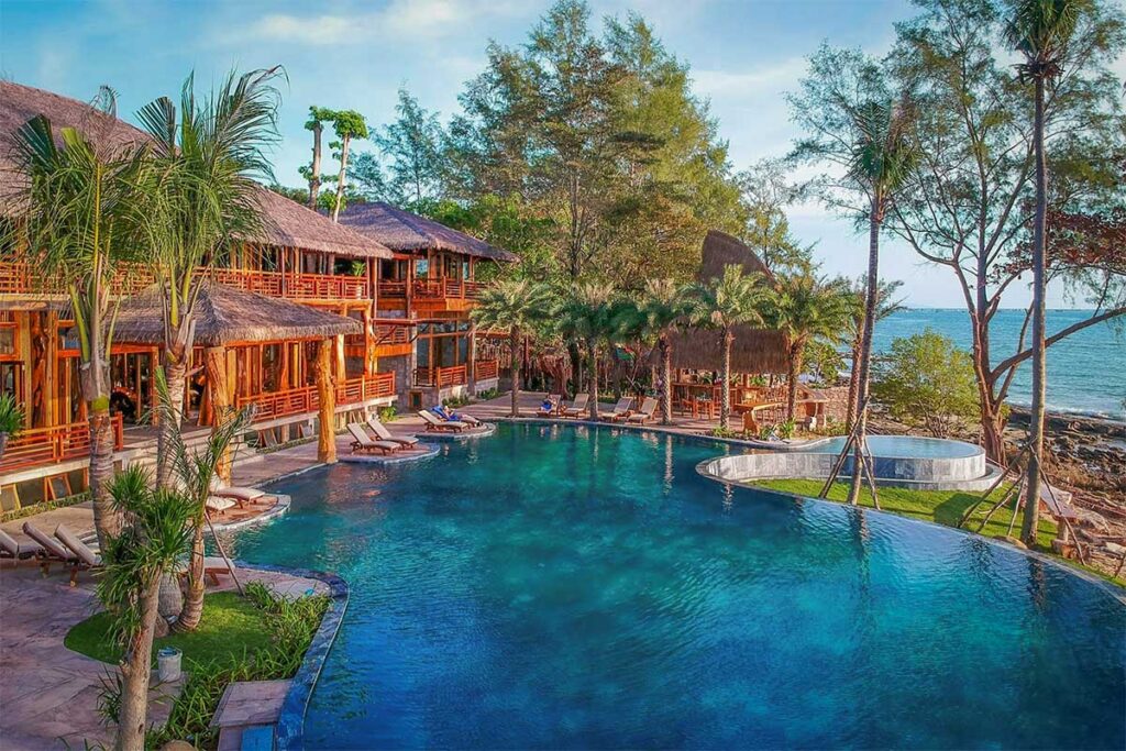 Garden bungalow resort surrounded by tropical trees at Ong Lang Beach Phu Quoc