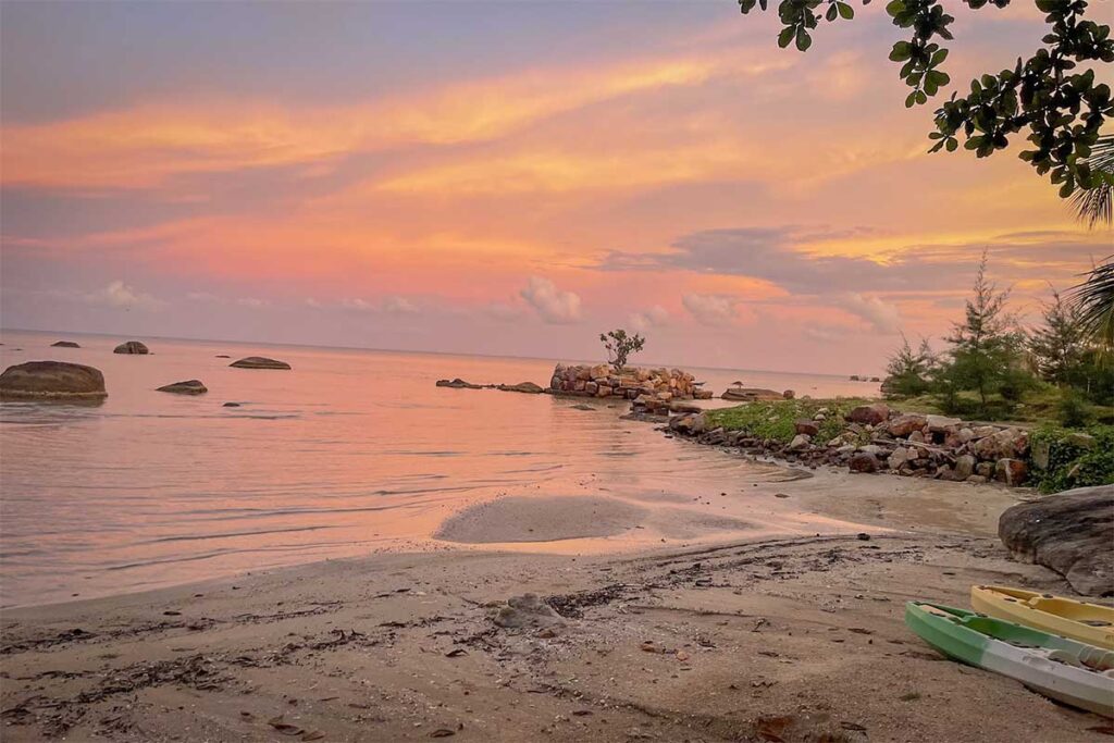 Cay Sao Beach Phu Quoc sunset view with calm sea sandy shore and colorful evening sky