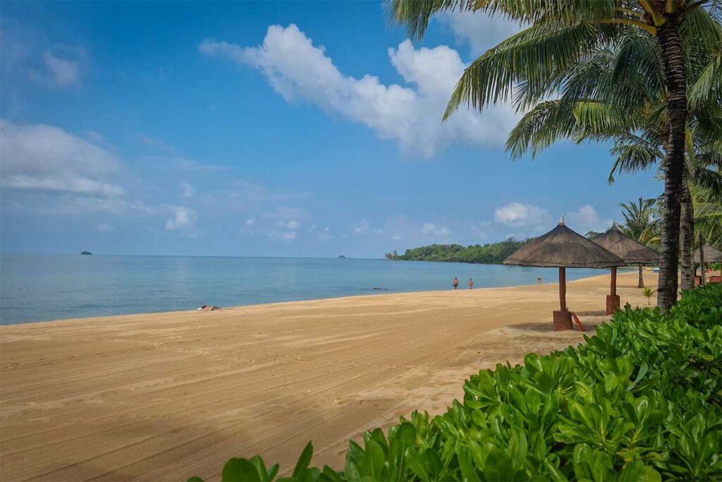 Peaceful Bai Dai Beach Phu Quoc with tropical umbrellas long sandy beach and calm sea