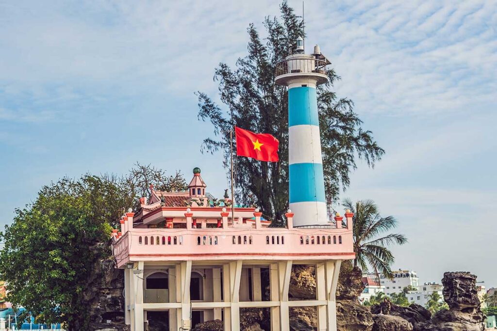 Dinh Cau Temple and lighthouse on rocky coast in Duong Dong Phu Quoc