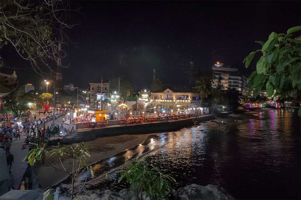 Dinh Cau waterfront in Duong Dong Phu Quoc at night with seaside restaurants and lights