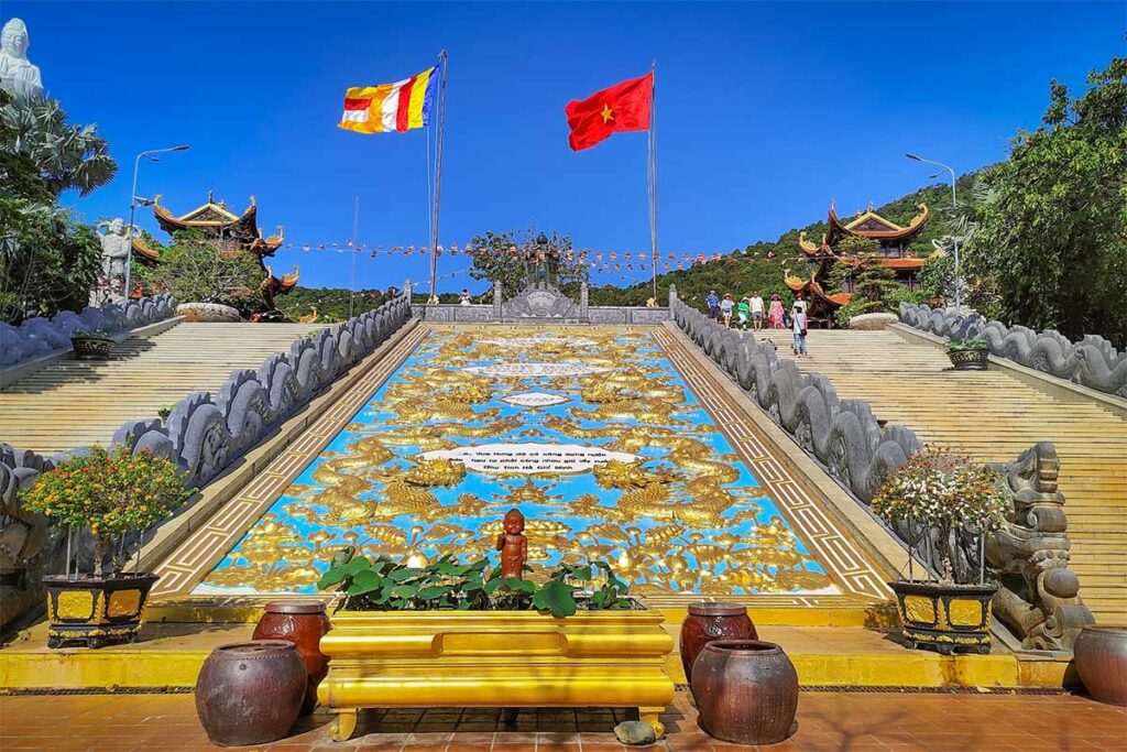 Dragon staircase at Ho Quoc Pagoda with decorative steps and temple buildings in Phu Quoc