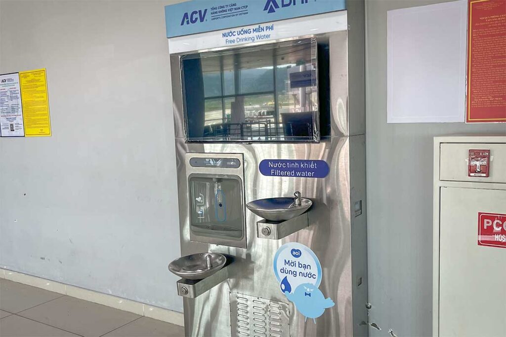 Free drinking water station inside Phu Quoc Airport departure area for travelers