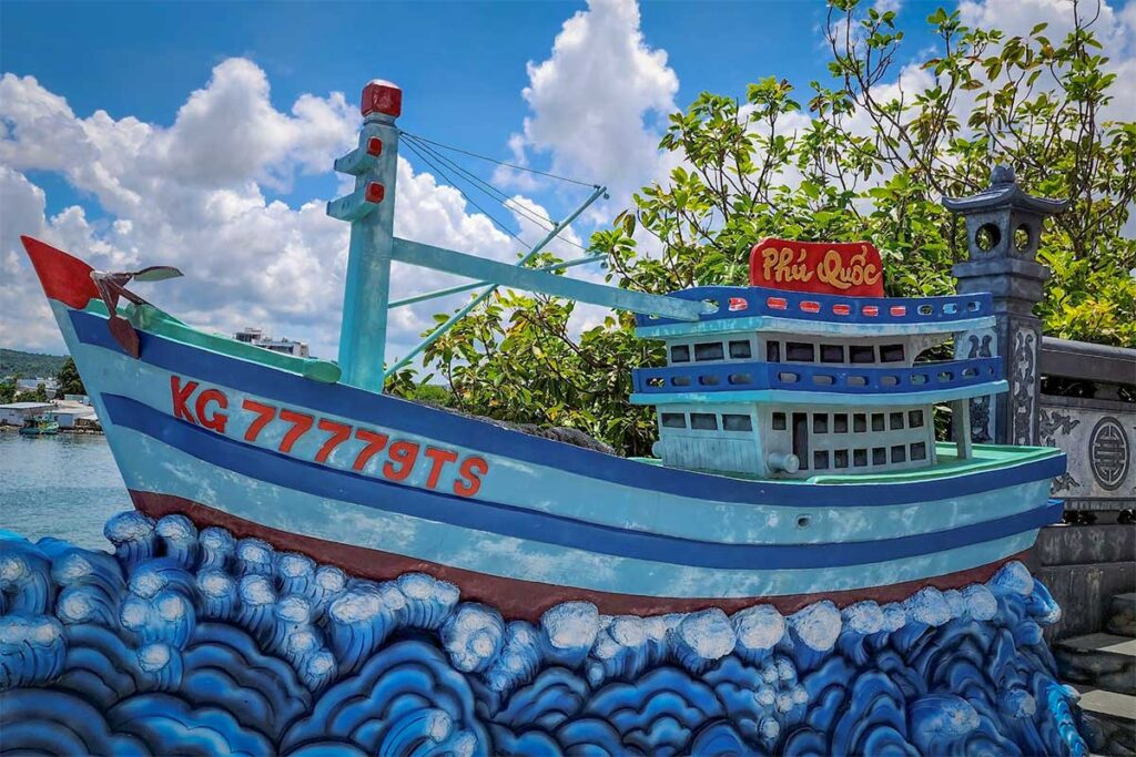 Fishing boat statue at Dinh Cau Temple in Phu Quoc showing island fishing culture
