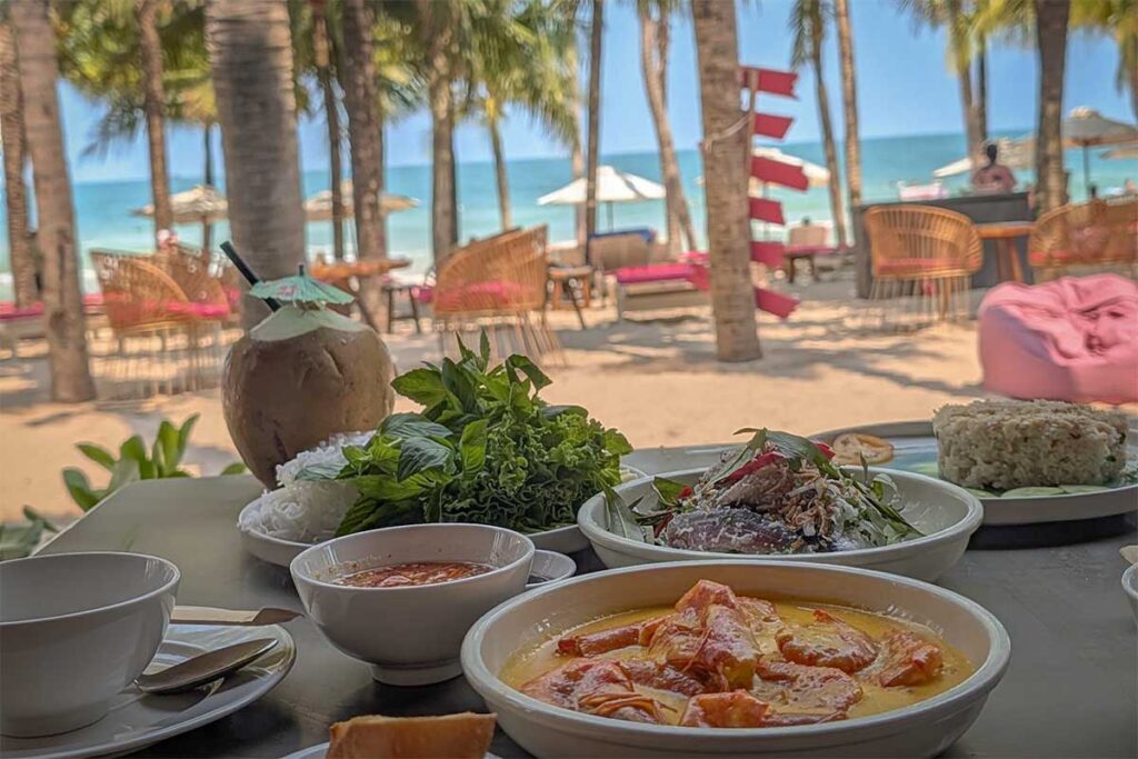 Seafood lunch at Bai Khem Phu Quoc beach restaurant with tropical drinks and ocean view seating