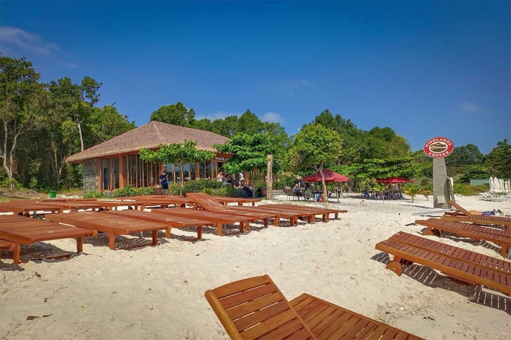 Highlands Coffee at Sao Beach Phu Quoc with beach loungers and sandy beachfront area