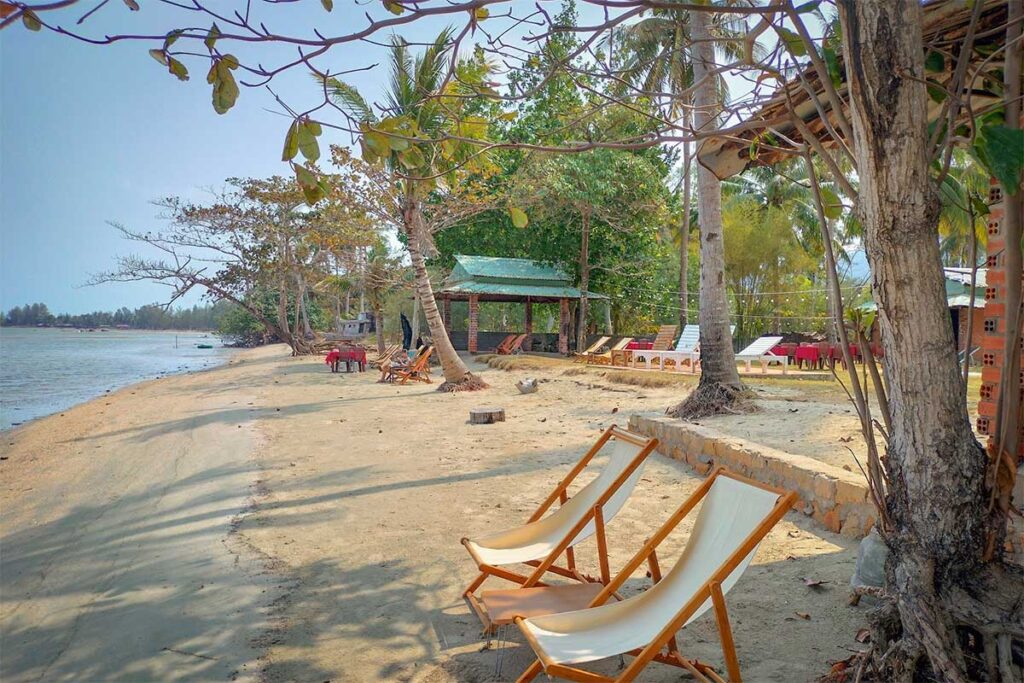 Local beachfront place at Bai Thom Beach Phu Quoc with sun loungers sandy shore and peaceful sea view