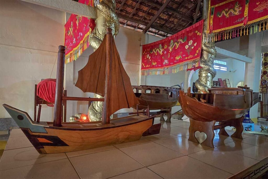Model wooden boats inside Nguyen Trung Truc Temple Phu Quoc representing historic naval battle of national hero