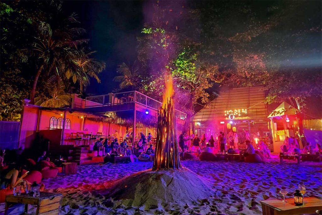 Long Beach Phu Quoc nightlife at beach bar with bonfire music and colorful evening atmosphere