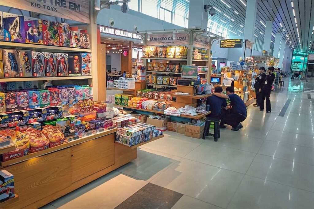 Shops inside Phu Quoc Airport terminal selling toys snacks gifts and travel items