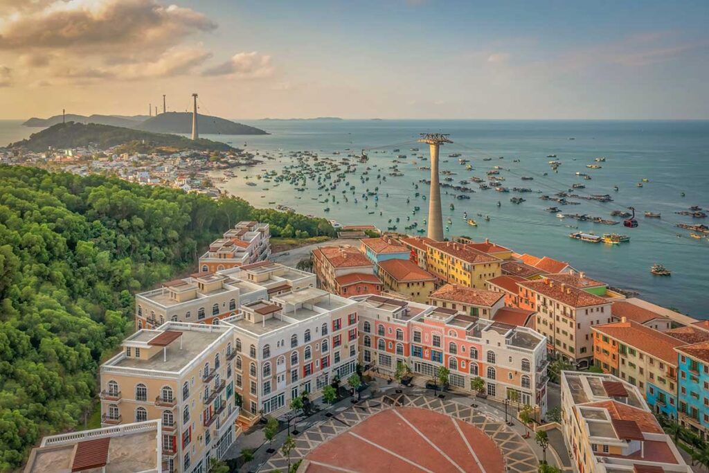 Sunset Town Phu Quoc with cable car tower colorful buildings and sea views near An Thoi