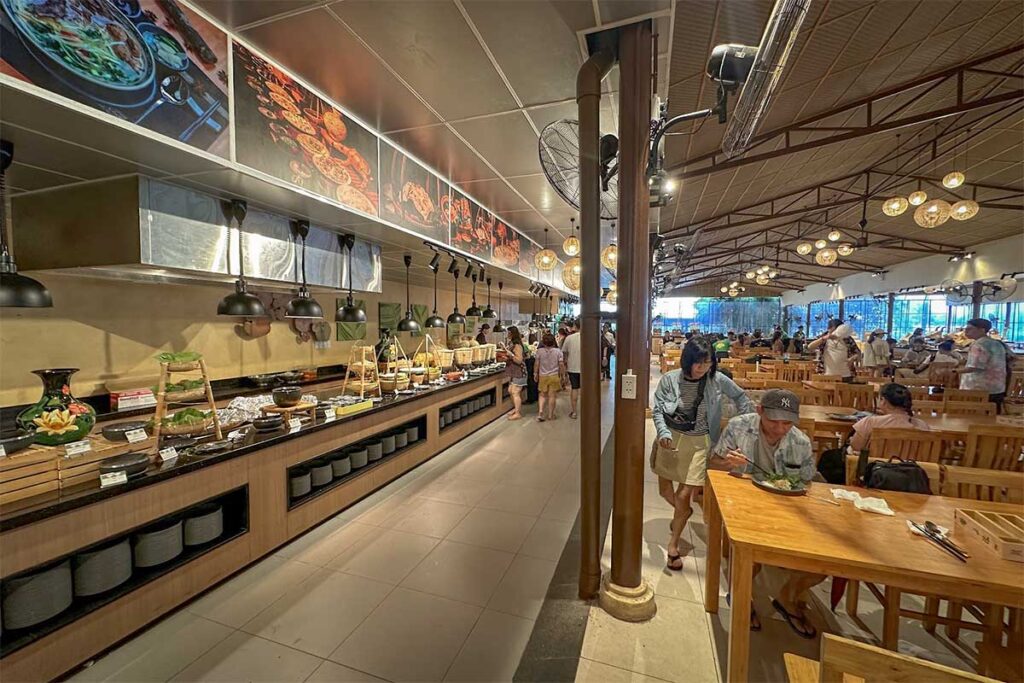 Buffet restaurant at Sun World Hon Thom Phu Quoc with food stations and seating area for visitors