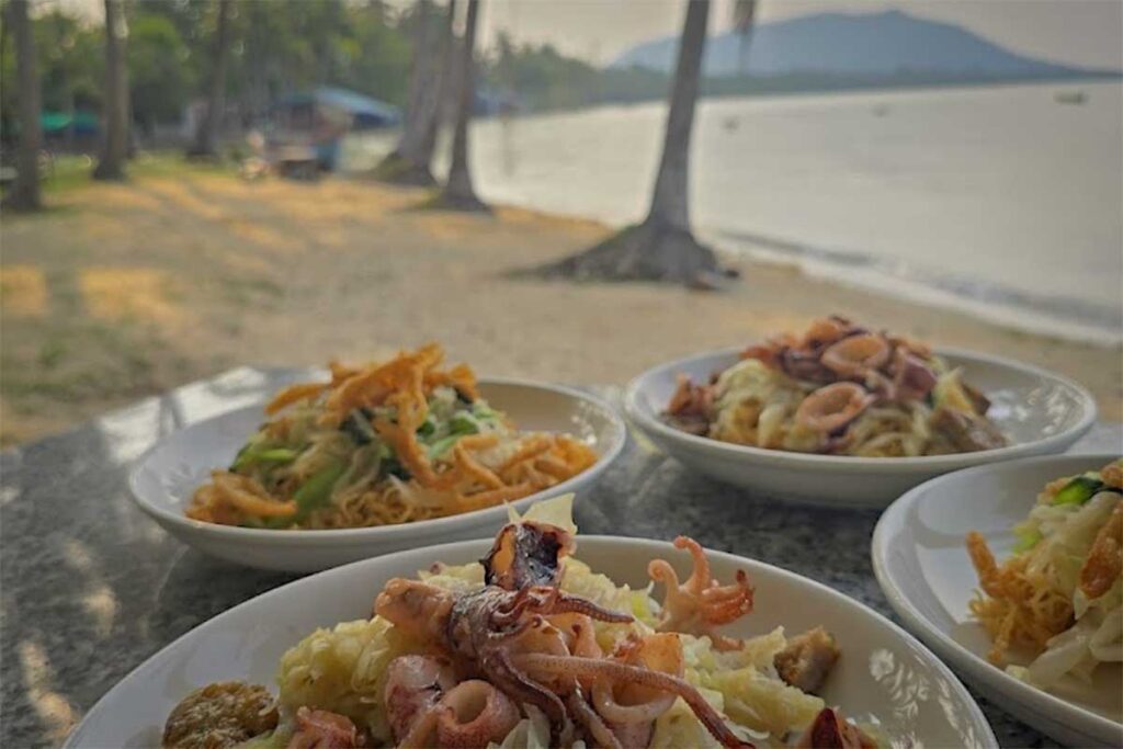 Fresh seafood lunch at Bai Thom Beach Phu Quoc served at a beachfront restaurant with sea view
