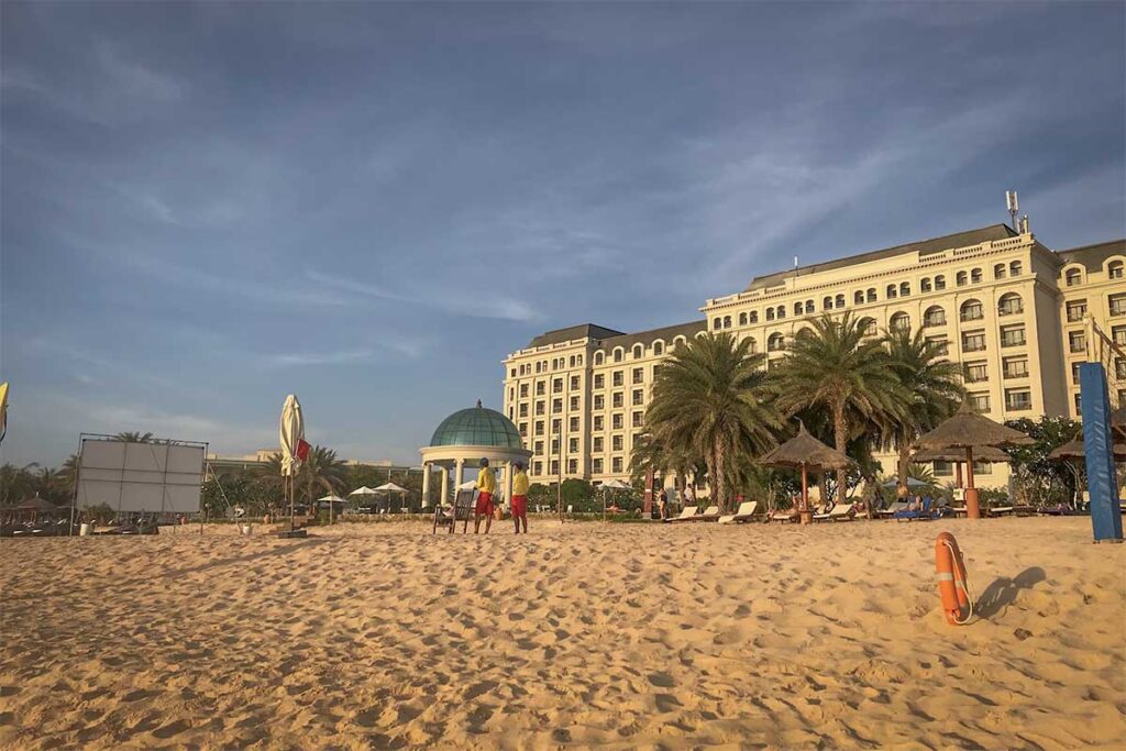 Sheraton Phu Quoc resort beachfront at Bai Dai Beach with wide sandy shore and palm trees