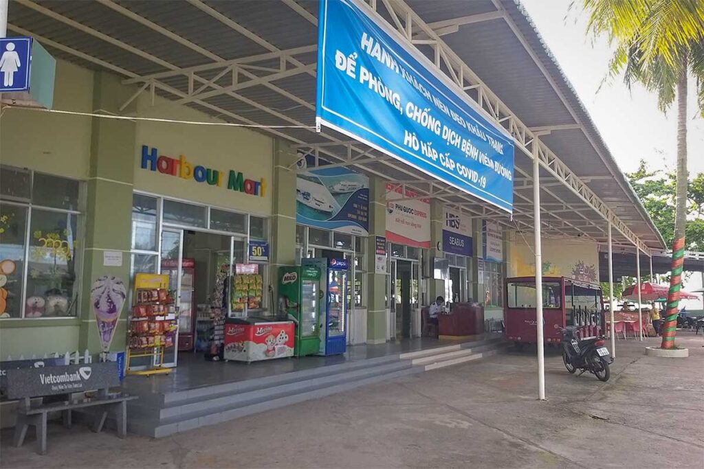Small convenience store and waiting area at Bai Vong Port ferry terminal in Phu Quoc