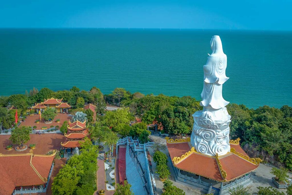 Aerial view of Ho Quoc Pagoda with giant white Buddha statue and ocean views in Phu Quoc