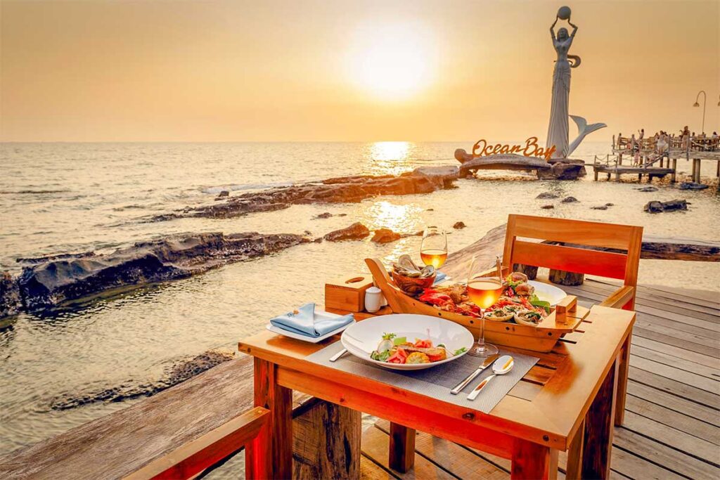 Sunset dinner by the sea at Ong Lang Beach Phu Quoc with seafood and ocean view