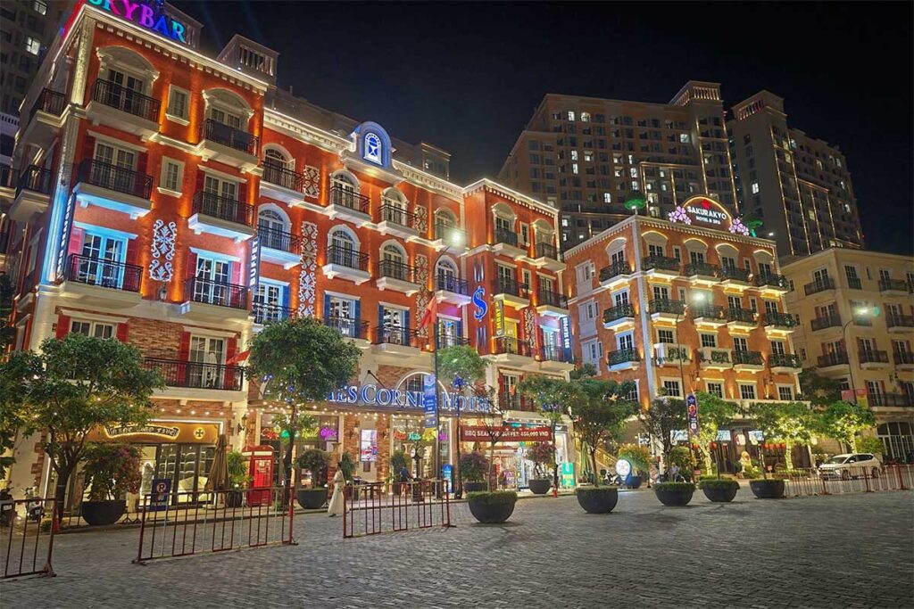 Sunset Town Phu Quoc at night with illuminated buildings lively streets and vibrant evening atmosphere