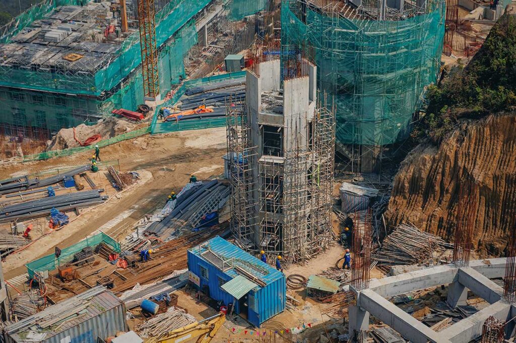 large construction site in Vietnam with dust and building activity contributing to urban air pollution