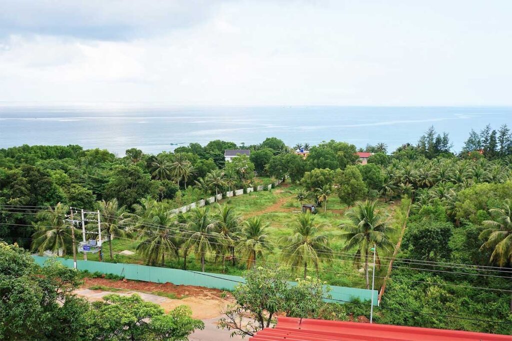 Rooftop terrace view from Coi Nguon Museum Phu Quoc overlooking town hills and surrounding landscape