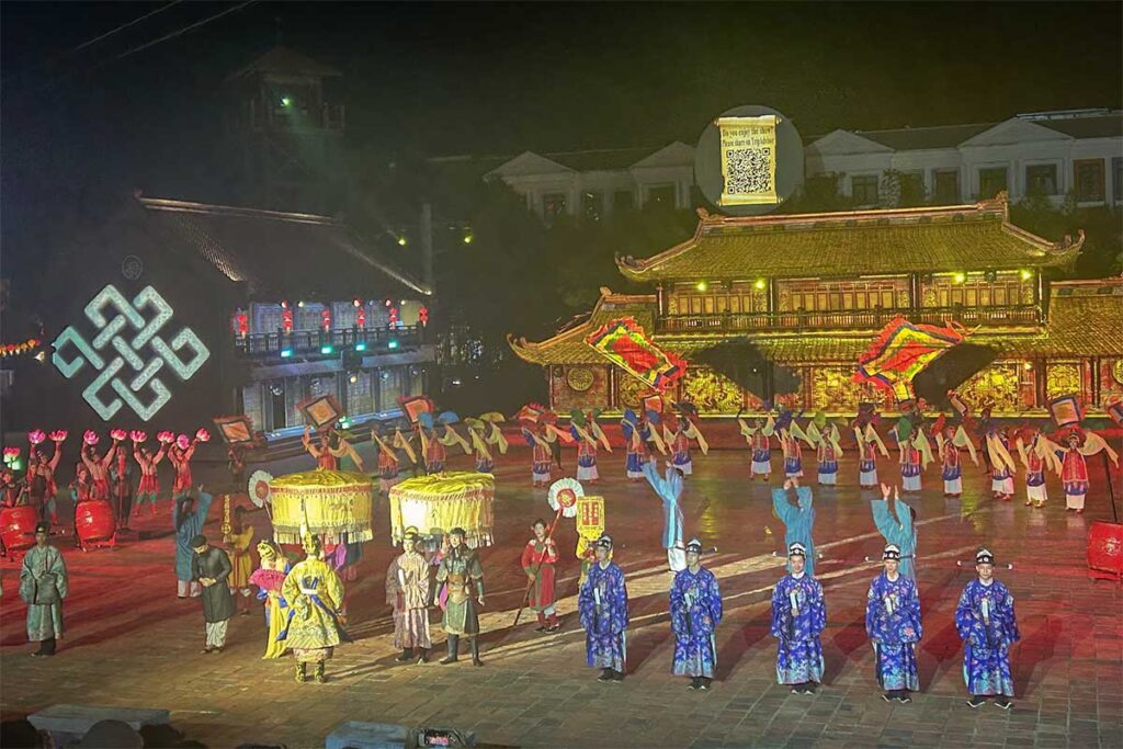 Large cultural performance during The Quintessence of Vietnam show at Grand World Phu Quoc with traditional costumes and stage lighting