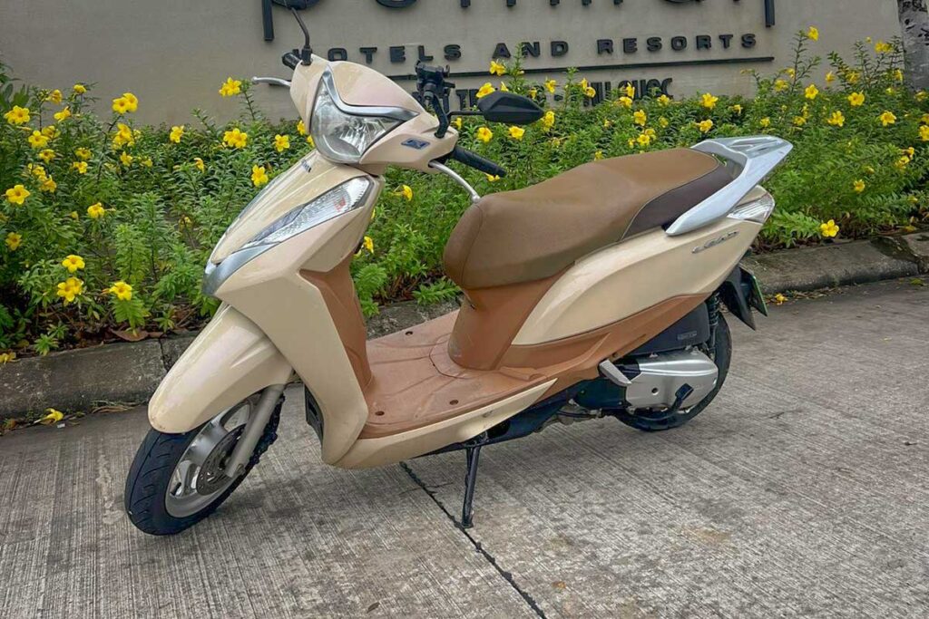 Honda Lead automatic scooter for rent in Phu Quoc, parked in front of the Pullman hotel on Long Beach