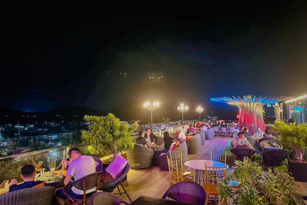 PH Rooftop Bar and Lounge in Phu Quoc with rooftop seating, cocktails, and panoramic night views over An Thoi and the southern coastline