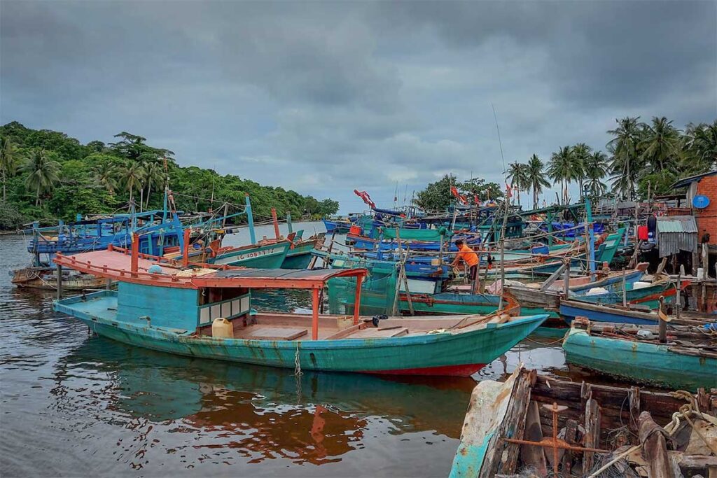 Traditional wooden fishing boats docked at Rach Tram Fishing Village in remote northern Phu Quoc