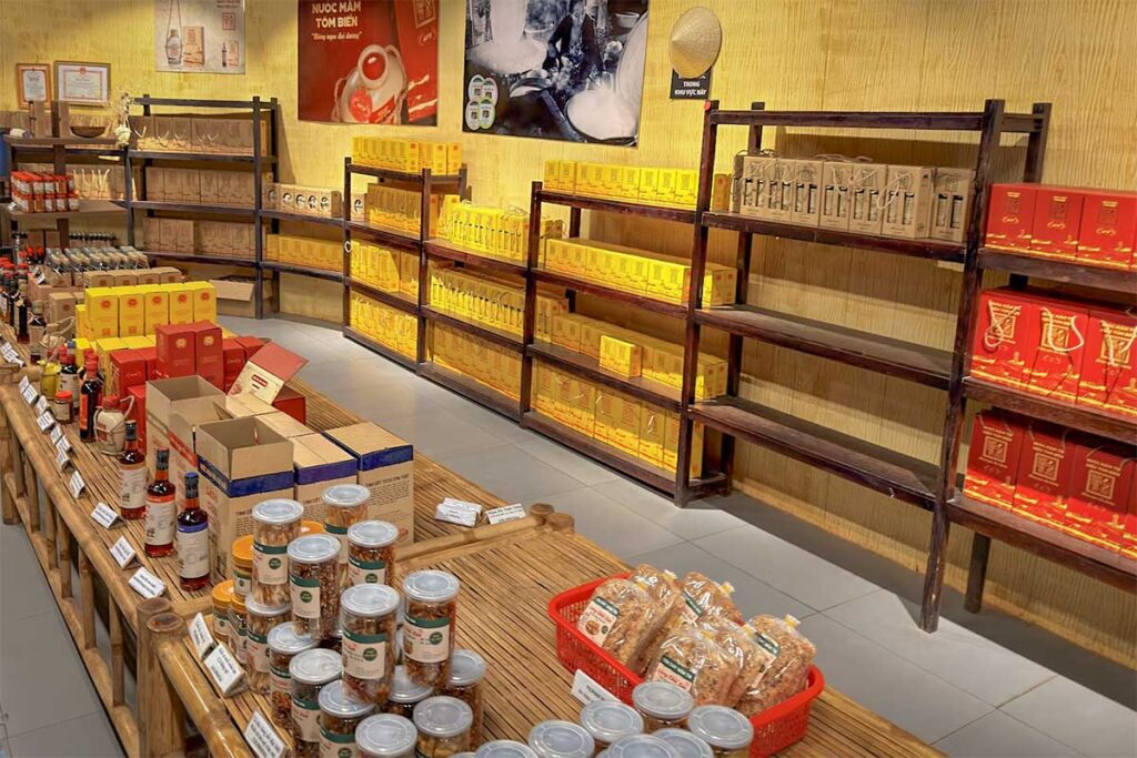 Souvenir shop at Lang Chai Xua Fish Sauce Museum in Phan Thiet selling traditional fish sauce, local snacks and packaged gifts
